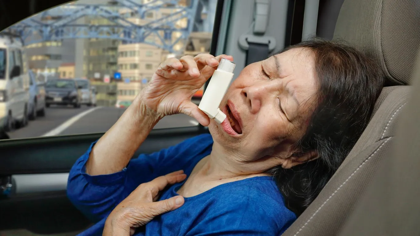 Woman practicing yoga for asthma control