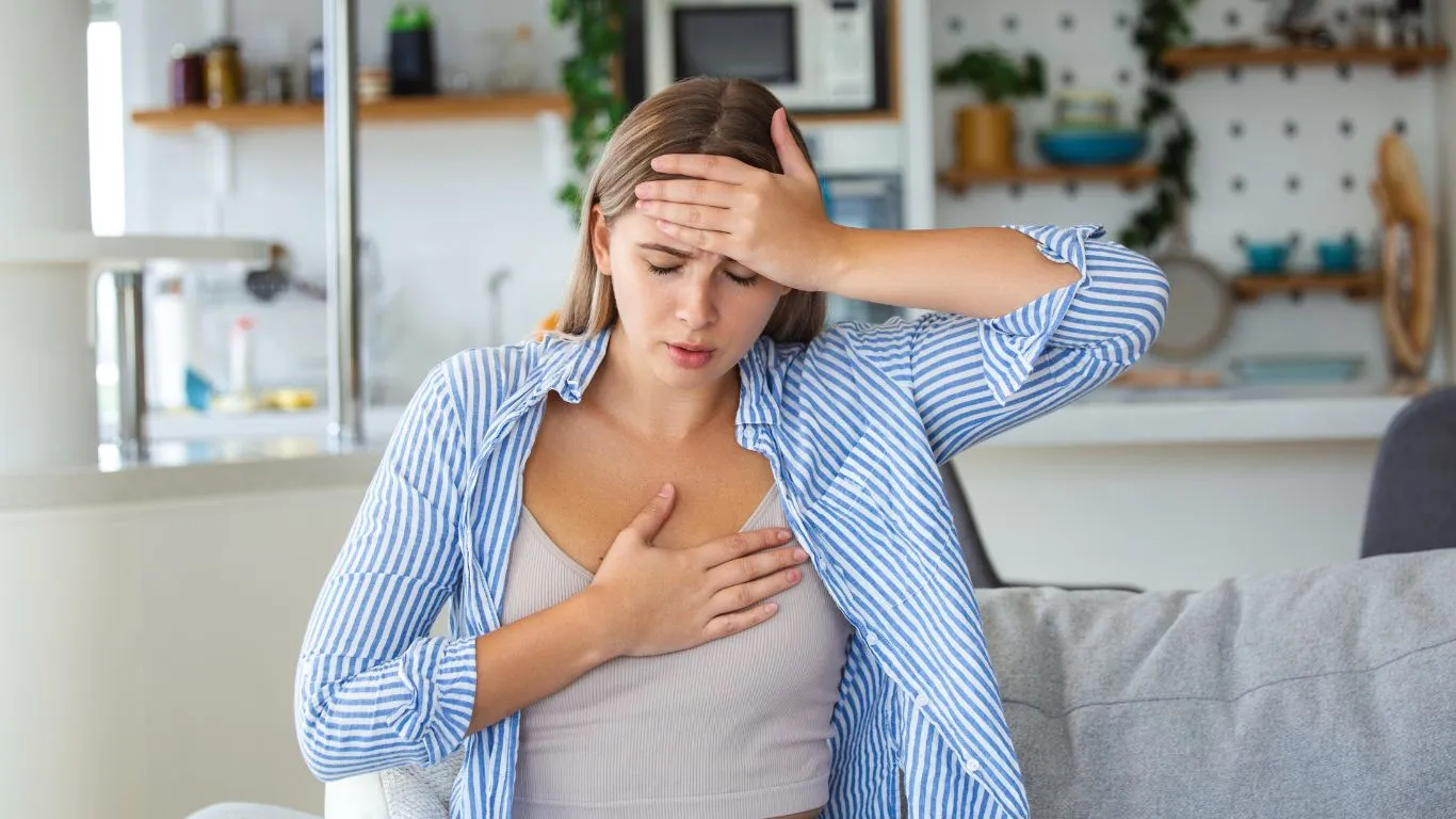 Person using a humidifier to improve air quality for asthma