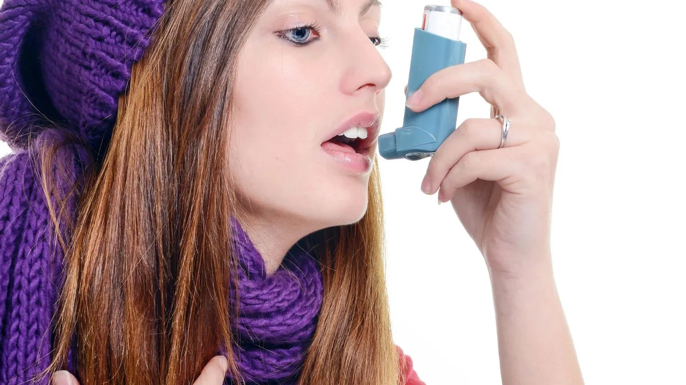 Close-up of asthma medication and inhaler