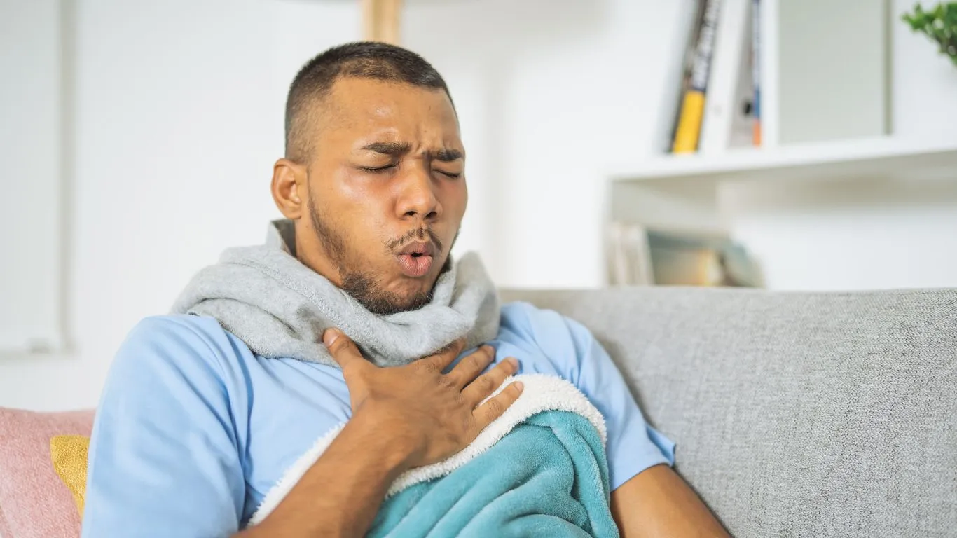 Person walking outside for asthma-friendly exercise