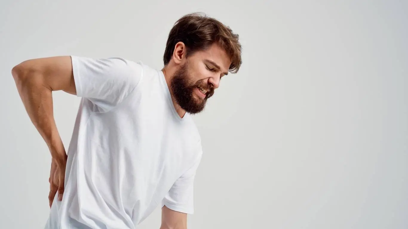 Person in supported passive backbend yoga pose