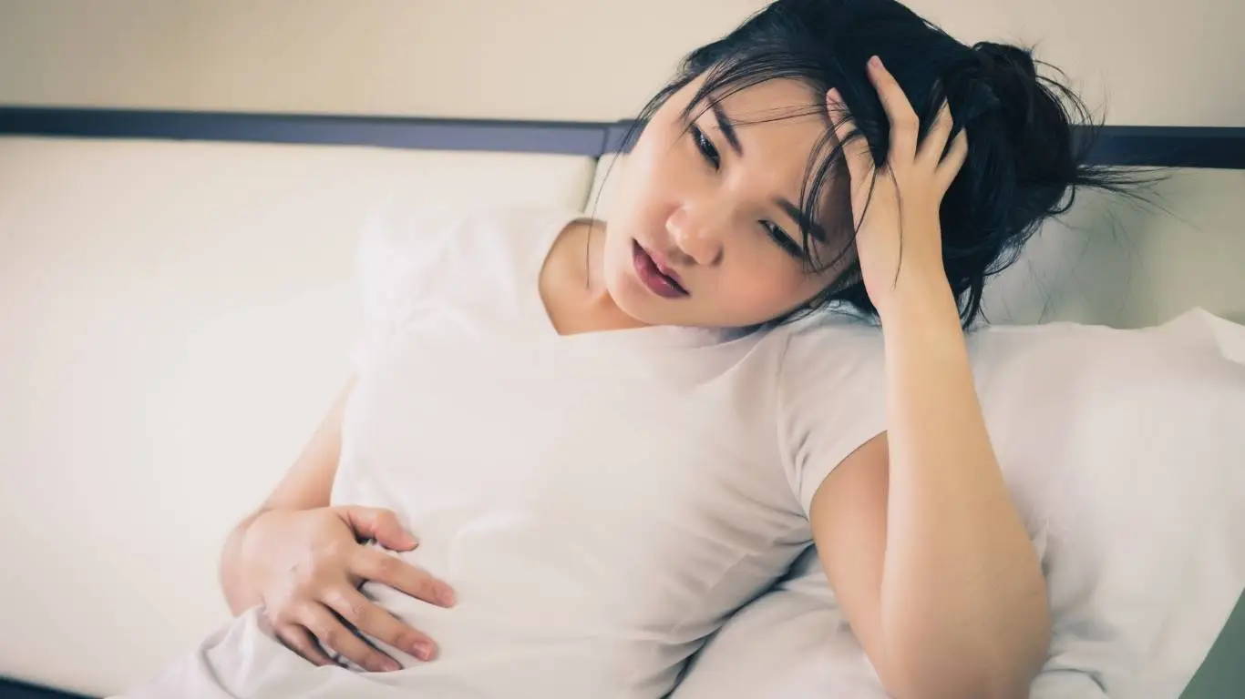 Patient reading a medical guide on back pain